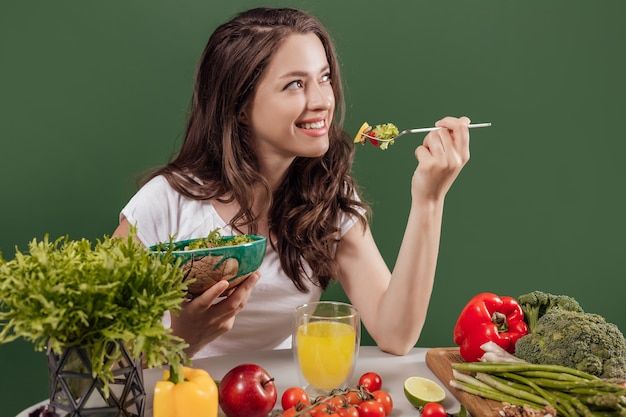 A girl eating a healthy meal for better nutrition and wellness